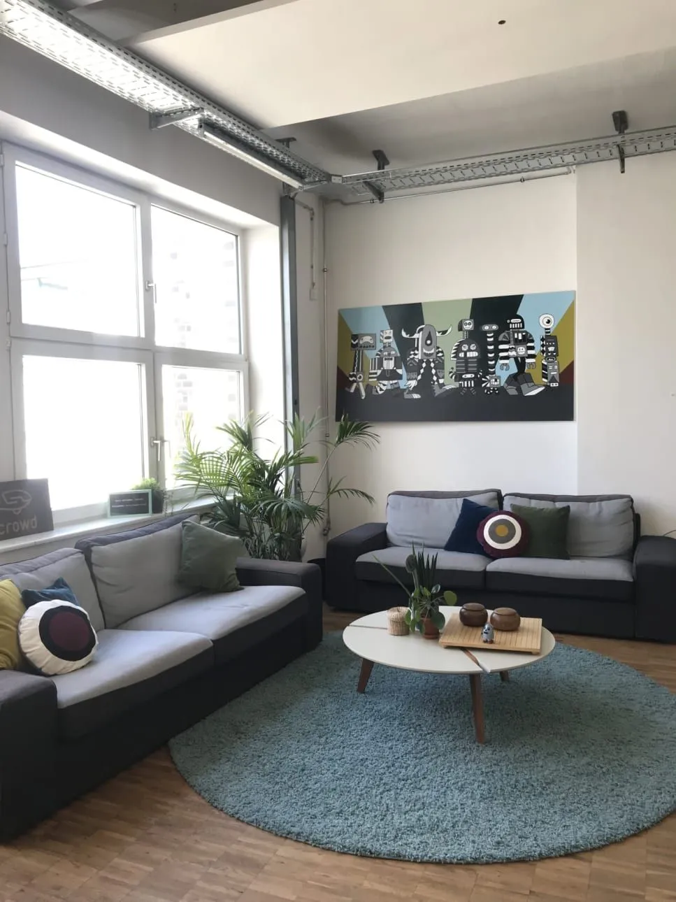 The lounge area in our office with two sofas.